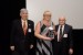 Prof. Grandon Gill, Chair of the Award Ceremony, and Dr. Nagib Callaos, General Chair, giving Prof. Natalja Lace a plaque "In Appreciation for Delivering a Great Keynote Address at a Plenary Session."